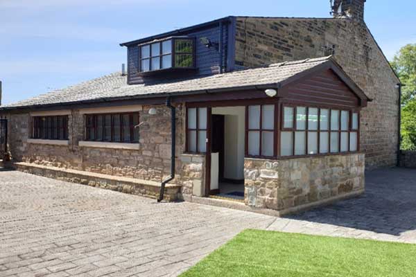 Front view of Whitehill Cottage home